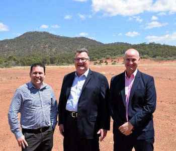 Gladstone Region mayor Matt Burnett, Australian Future Energy chief executive officer Kerry Parker and Member for Gladstone Glenn Butcher at the site of $1 billion Gladstone Energy and Ammonia Project located in the Gladstone State Development Area at Yarwun.